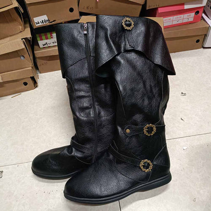 Black medieval renaissance flat boots featuring decorative buttons and a stylish fold-over design