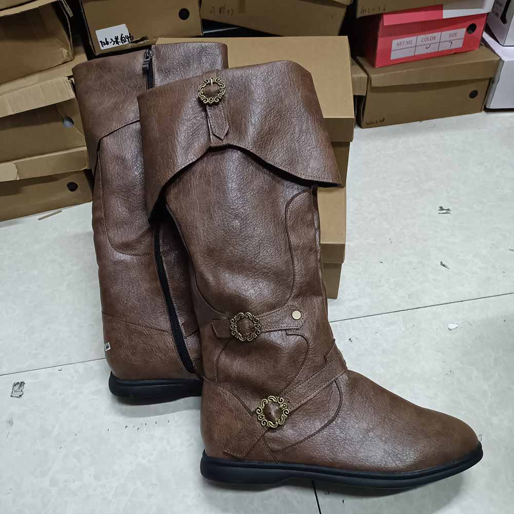 Brown medieval renaissance flat boots with decorative buttons and a fold-over design