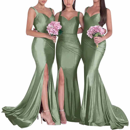 Three models wearing long satin mermaid bridesmaid dresses in sage green with elegant splits