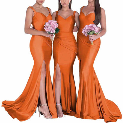 Three models in orange mermaid bridesmaid dresses long satin with elegant slits and fitted silhouettes