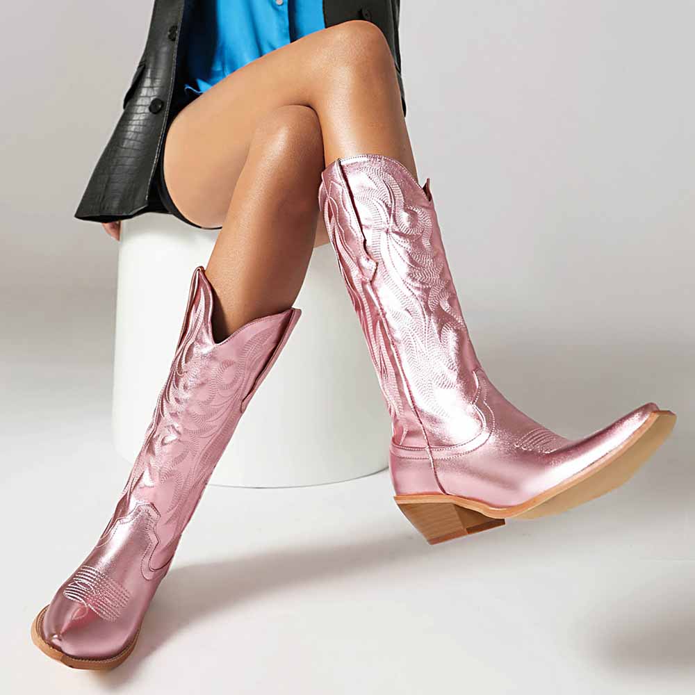 Shiny pink metallic cowboy boots for women with intricate stitching and a stylish design
