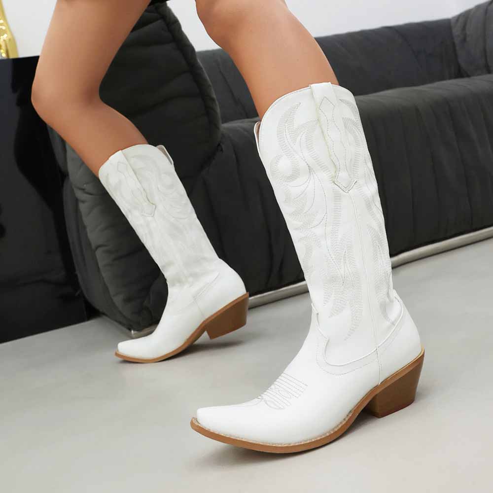 Stylish metallic cowboy boots for women with intricate designs and a pointed toe
