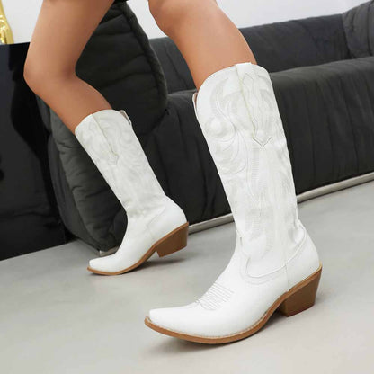 Stylish metallic cowboy boots for women with intricate designs and a pointed toe