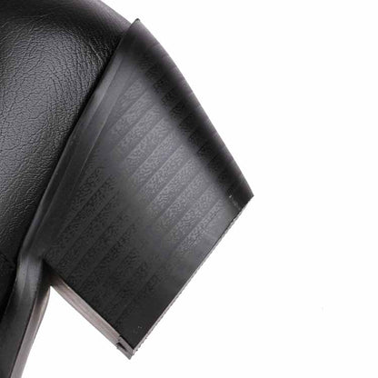 Close-up of black chunky heel on mid-calf western boots from sd-hk, highlighting stylish design