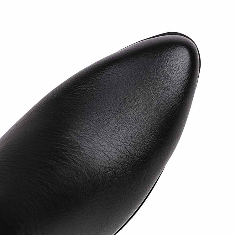 Close-up of black mid-calf western boots chunky heel showcasing sleek design and quality material