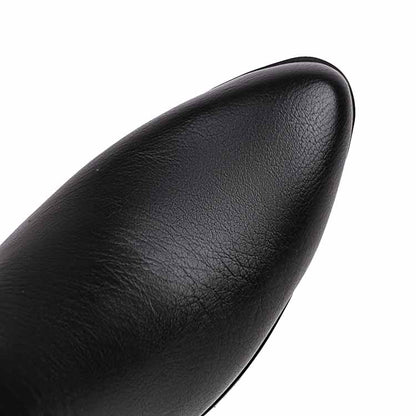 Close-up of black mid-calf western boots chunky heel showcasing sleek design and quality material