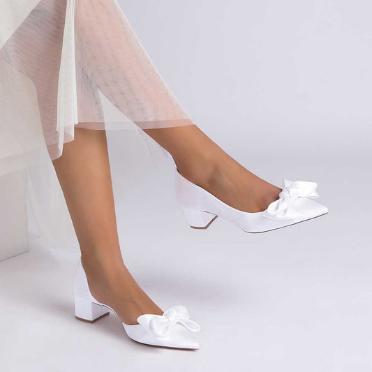 Elegant mid heel bridal shoes with bow in white, perfect for wedding ceremonies