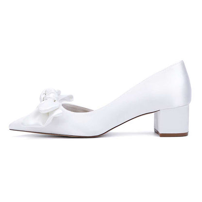 Elegant mid heel bridal shoes with bow in white for stylish wedding looks