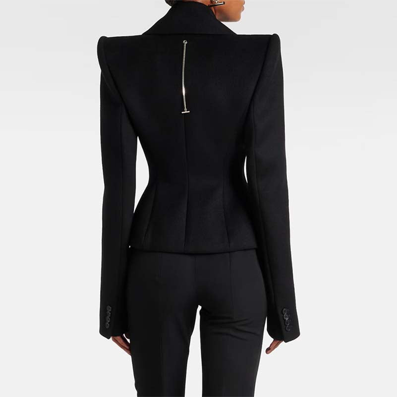 Back view of a black minimalist double-breasted wool coat with unique zipper design