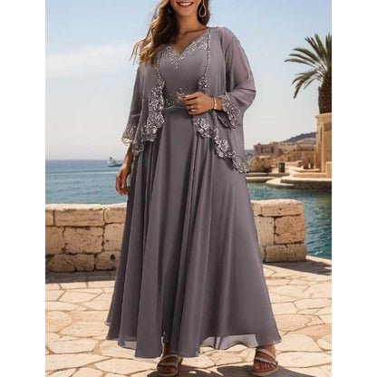 Elegant gray mother of the bride dresses with jacket featuring intricate lace detailing and flowing silhouette