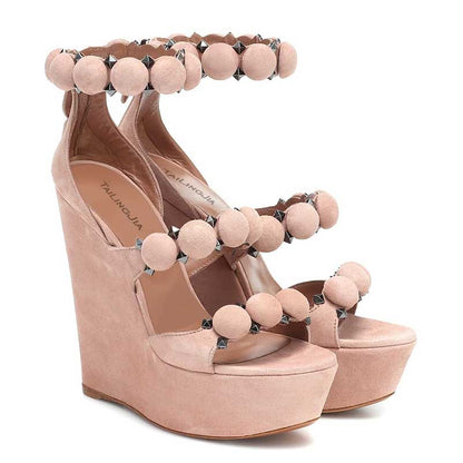 Stylish nude wedge sandals for special occasions featuring decorative beads and ankle straps