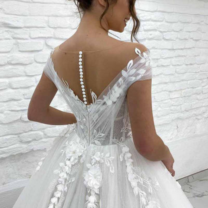 Elegant off the shoulder princess wedding dress with floral details and button back design