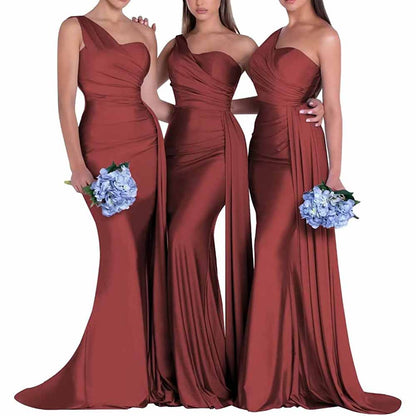 Three elegant one shoulder satin bridesmaid dresses in burgundy, perfect for wedding celebrations
