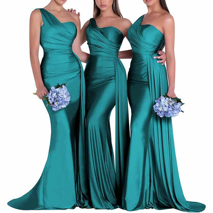 Elegant one shoulder satin bridesmaid dress in teal with fitted silhouette and flowing skirt