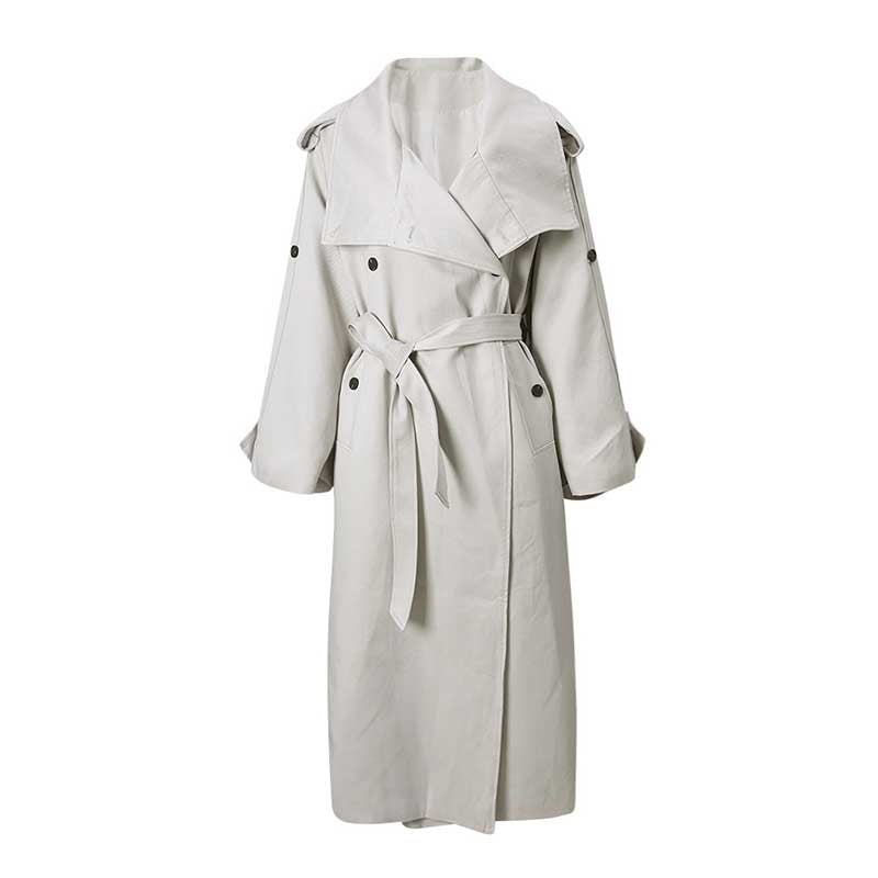 Light beige oversize women's trench coat with wide lapels and a belted waist for a stylish look