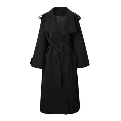 Black oversized women's trench coat with a belted waist and stylish design for a chic look