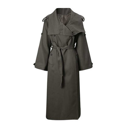Stylish oversize women's trench coat in olive green with a belted waist and wide sleeves