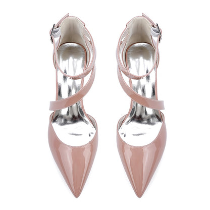 Elegant patent leather bridal heels in blush pink with a pointed toe and ankle straps