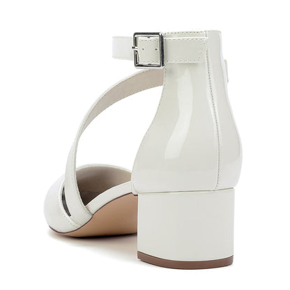 Elegant patent leather bridal heels with ankle strap and block heel for a stylish wedding look
