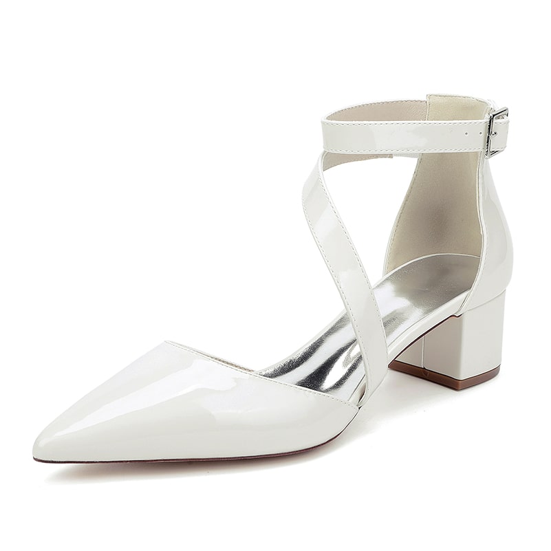 Elegant patent leather bridal heels with an ankle strap and a block heel for comfort and style