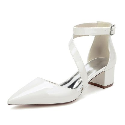 Elegant patent leather bridal heels with an ankle strap and a block heel for comfort and style