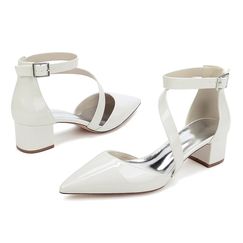 Elegant patent leather bridal heels with ankle strap and pointed toe design for weddings