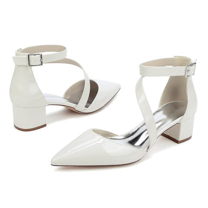 Elegant patent leather bridal heels with ankle strap and pointed toe design for weddings