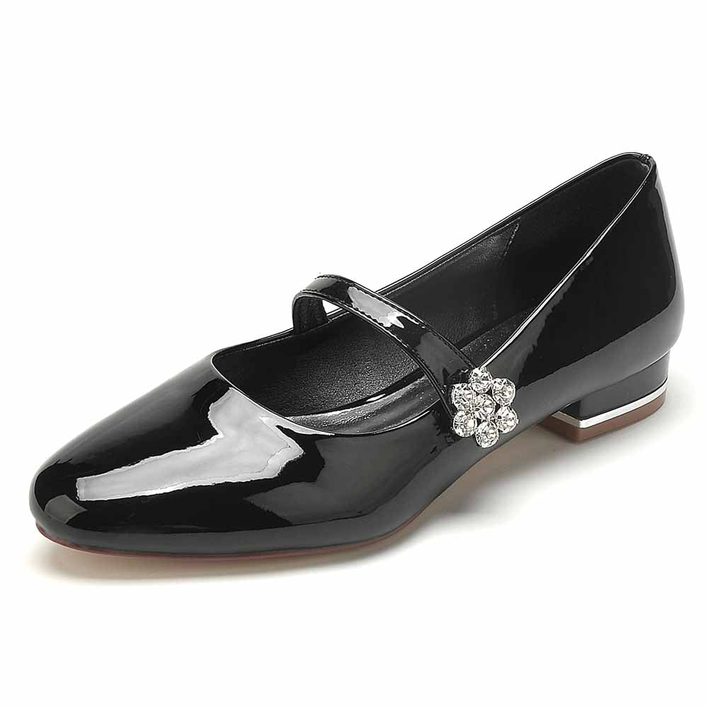 S&DCo. patent leather wedding shoes with a decorative flower detail and a secure strap for comfort