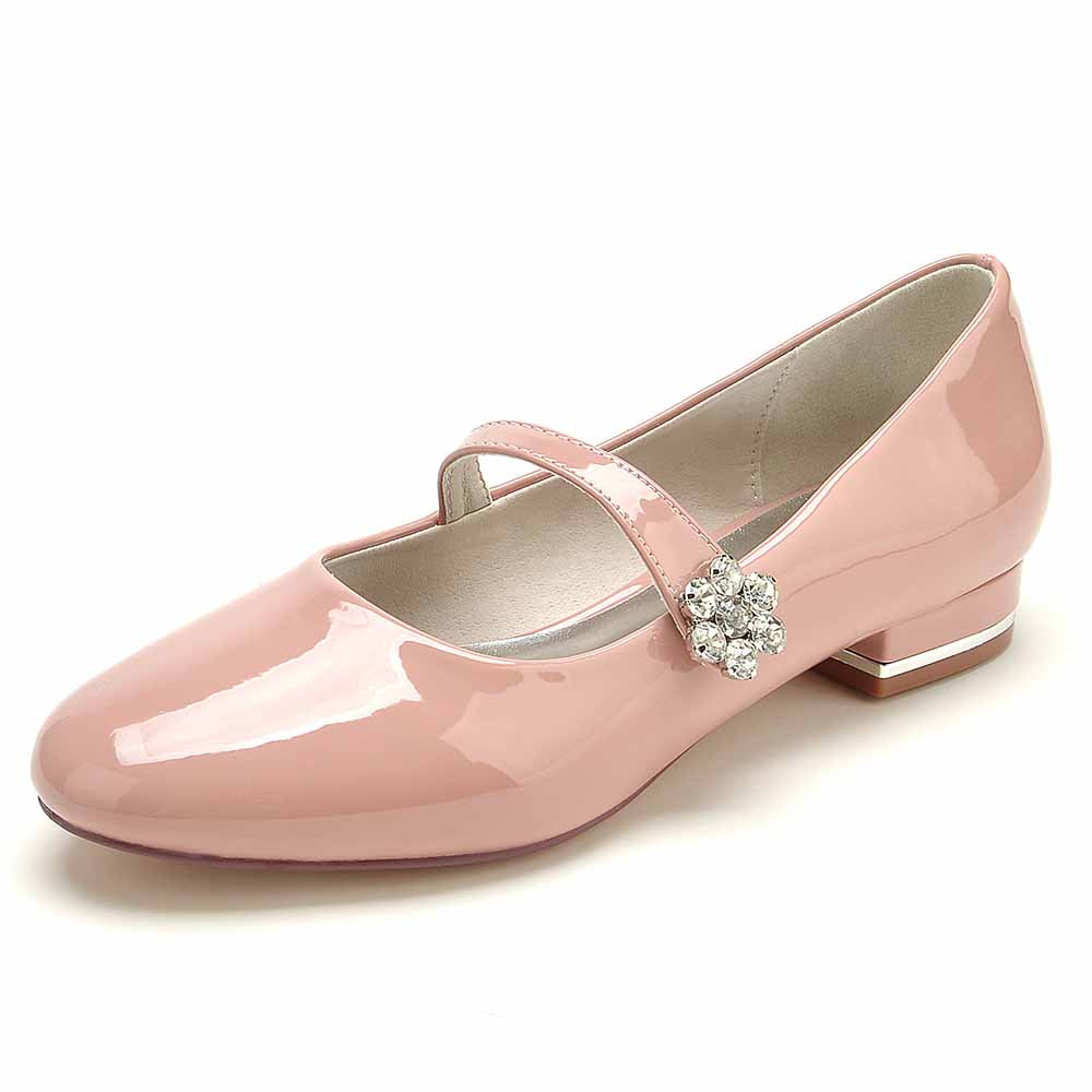 Pink patent leather wedding shoes from S&DCo with a decorative flower detail and low heel