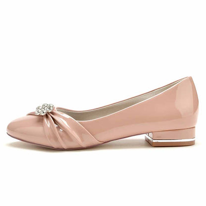S&DCo. patent leather wedding shoes in blush pink with decorative bow and low heel