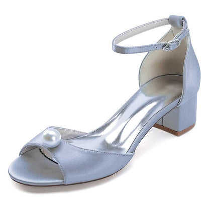 Light blue pearl block heel wedding sandals with an ankle strap and elegant pearl embellishment