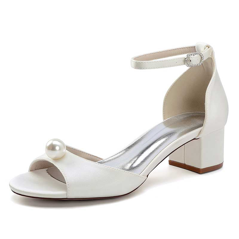 Elegant pearl block heel wedding sandals featuring a stylish ankle strap and a pearl accent