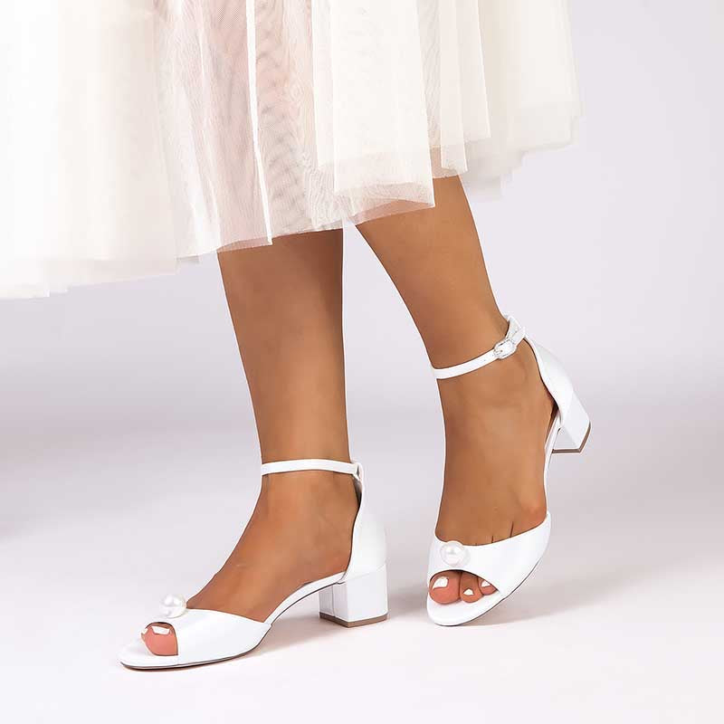 Elegant pearl block heel wedding sandals with open-toe design and ankle strap for bridal wear