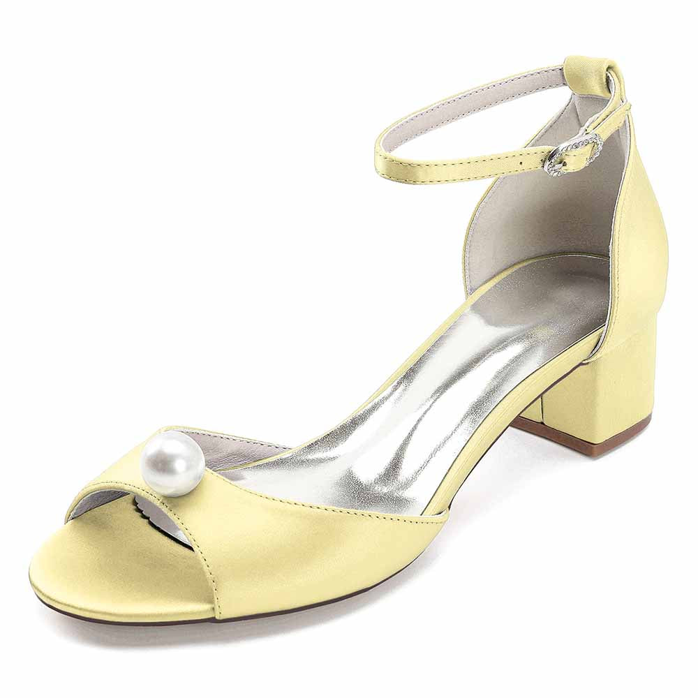Elegant pearl block heel wedding sandals in yellow with an ankle strap for a stylish bridal look