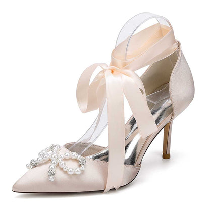 S&DCo. pearl bow bridal heels with satin finish and elegant ankle ribbons for weddings