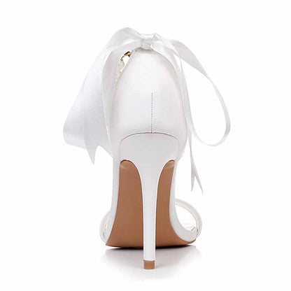 Elegant S&DCo. pearl bridal heels with a delicate ribbon detail for a stunning wedding look