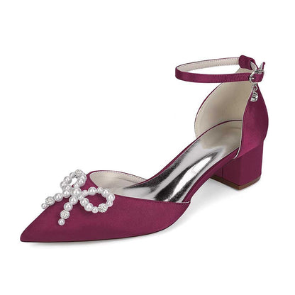 Elegant maroon pearl embellished bridal heels with ankle strap and decorative bow detail