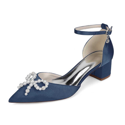 Elegant pearl embellished bridal heels in navy blue with ankle strap and stunning bow design