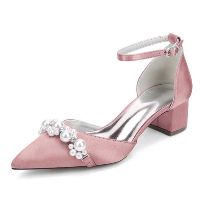 Pink satin pearl embellished bride shoes with block heel and ankle strap for elegant bridal style