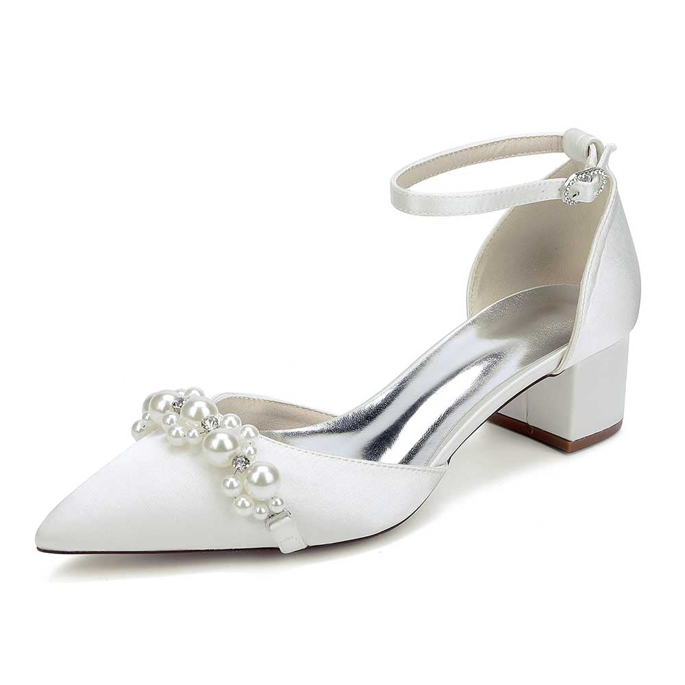 Elegant pearl embellished bride shoes with a stylish ankle strap and block heel for wedding day comfort