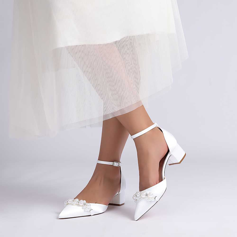 Elegant pearl embellished bride shoes with ankle strap in white for a stylish wedding look