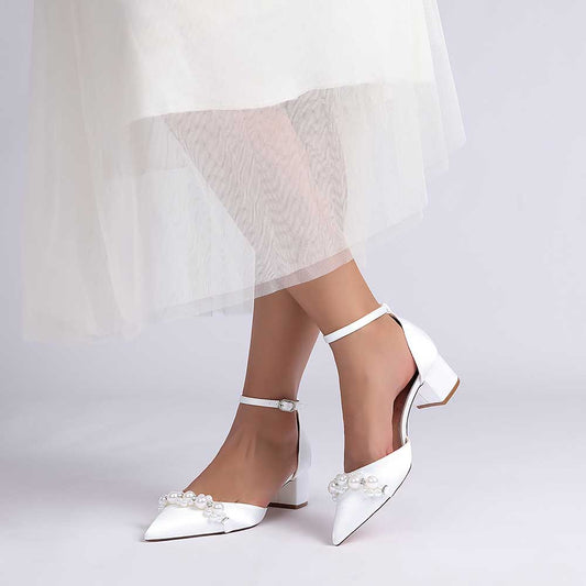 Elegant pearl embellished bride shoes with ankle strap in white for a stylish wedding look