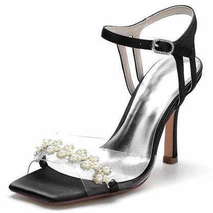 S&DCo. pearl embellished prom heels with a clear strap and black detailing for elegant occasions
