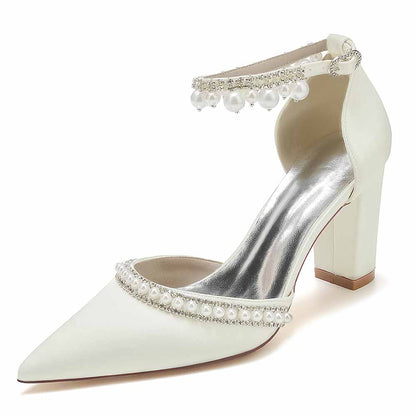Elegant pearl embellished satin high heels with a pearl ankle strap and pointed toe design