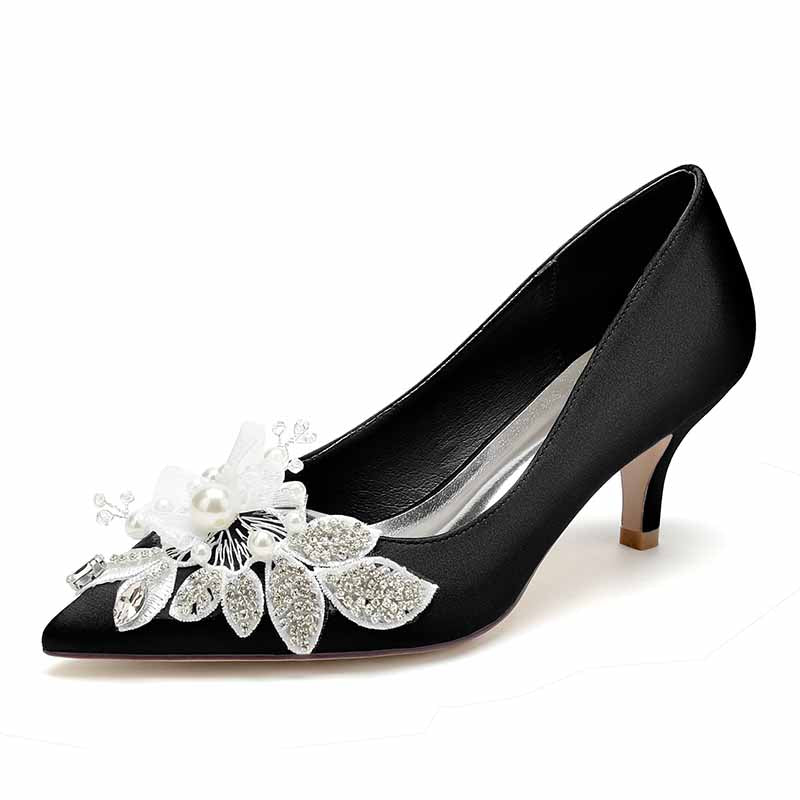 Elegant black heels with pearl embellished wedding shoes and decorative floral accents