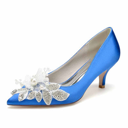 Elegant blue satin heels featuring pearl embellished wedding shoes with floral embellishments