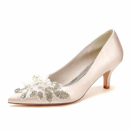 pearl embellished wedding shoes with elegant floral design and a pointed toe silhouette