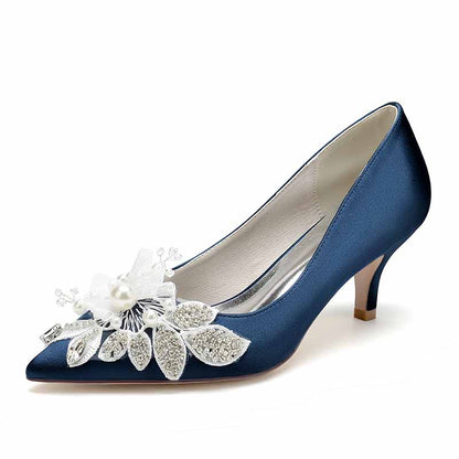 Navy heels with pearl embellished wedding shoes featuring a decorative floral design