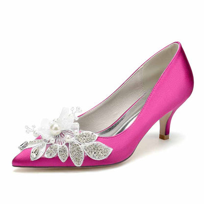 pink heels with pearl embellished wedding shoes and floral accents for elegant bridal looks