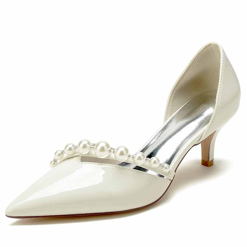Elegant white heels with pearl strap details, perfect for formal occasions and fashion-forward outfits